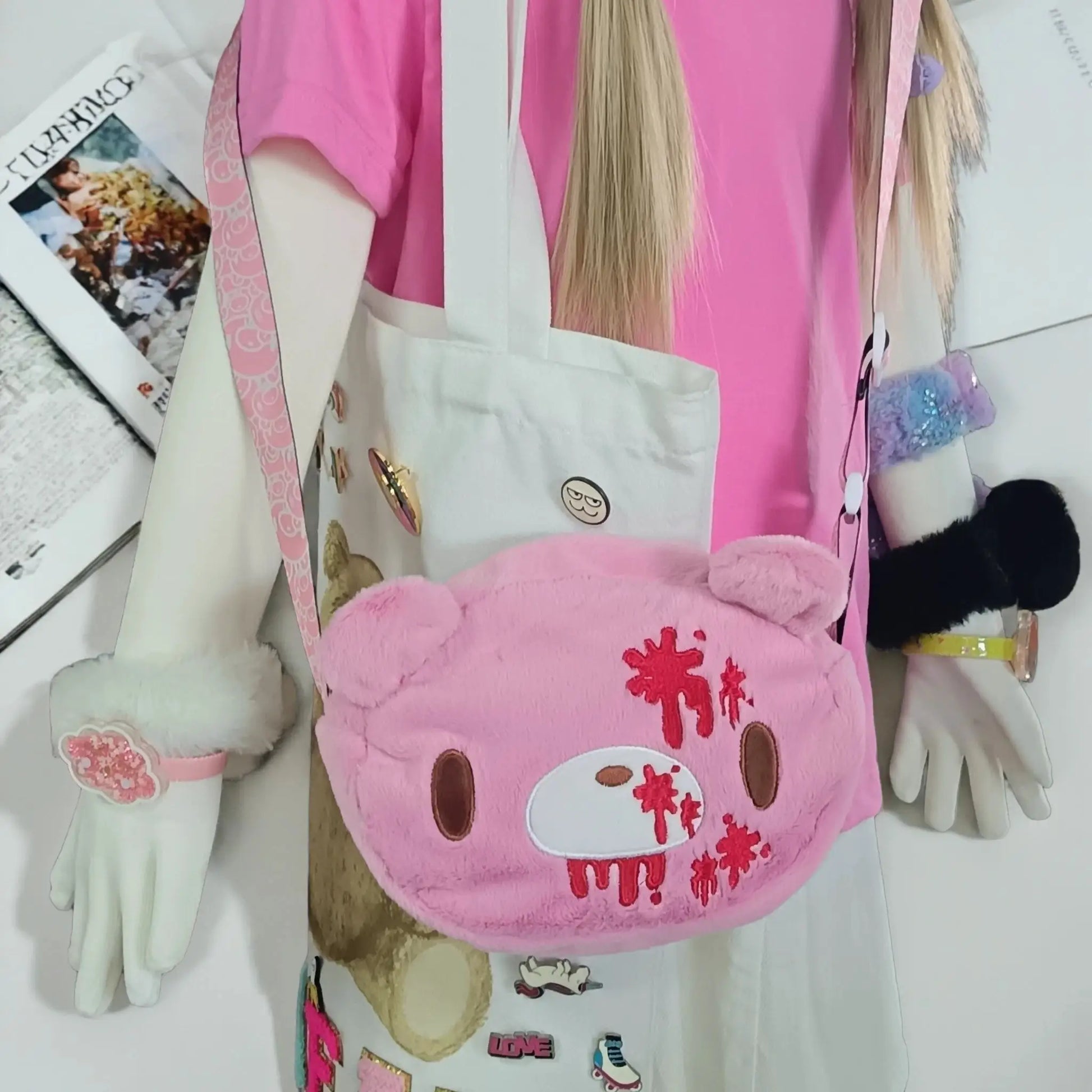 Gloomy Bear plush crossbody bag in pink with red blood-splatter details