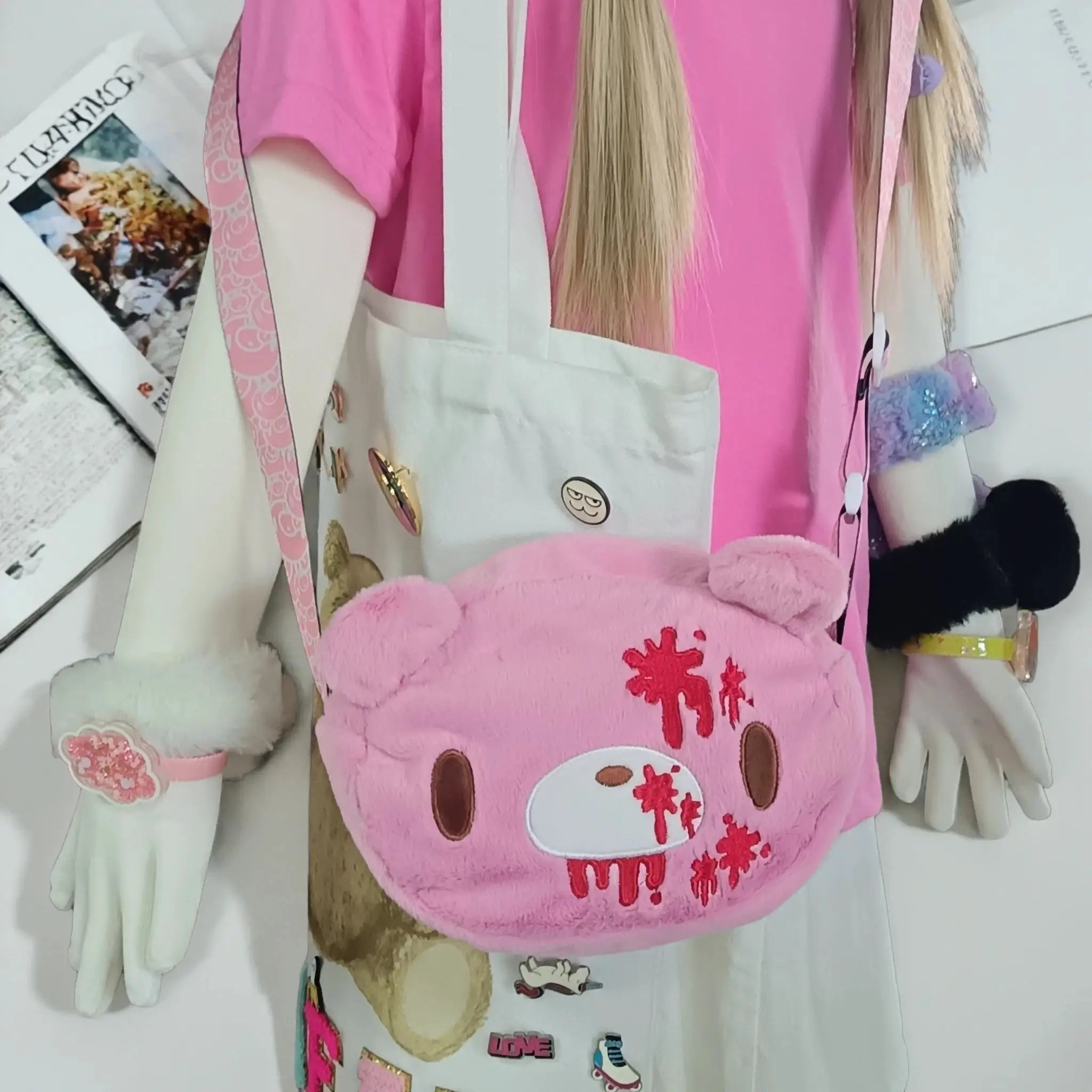 Gloomy Bear plush crossbody bag in pink with red blood-splatter details