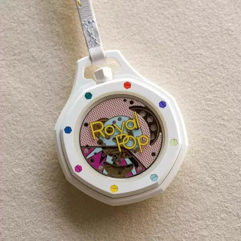 White octagonal quartz pocket watch with colorful gears, rainbow gemstone bezel accents and Royal Pop logo