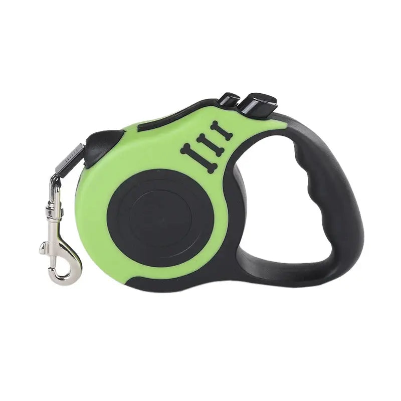 Retractable dog leash, green body with black handle and metal clip.
