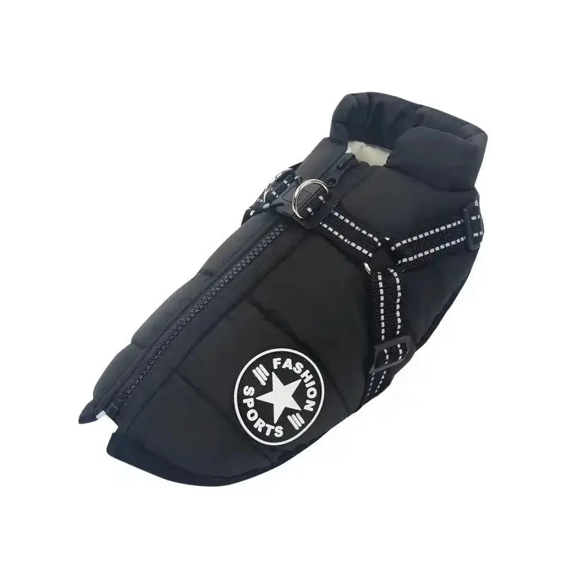 Large black quilted dog jacket with harness, reflective stitching and a metal D-ring