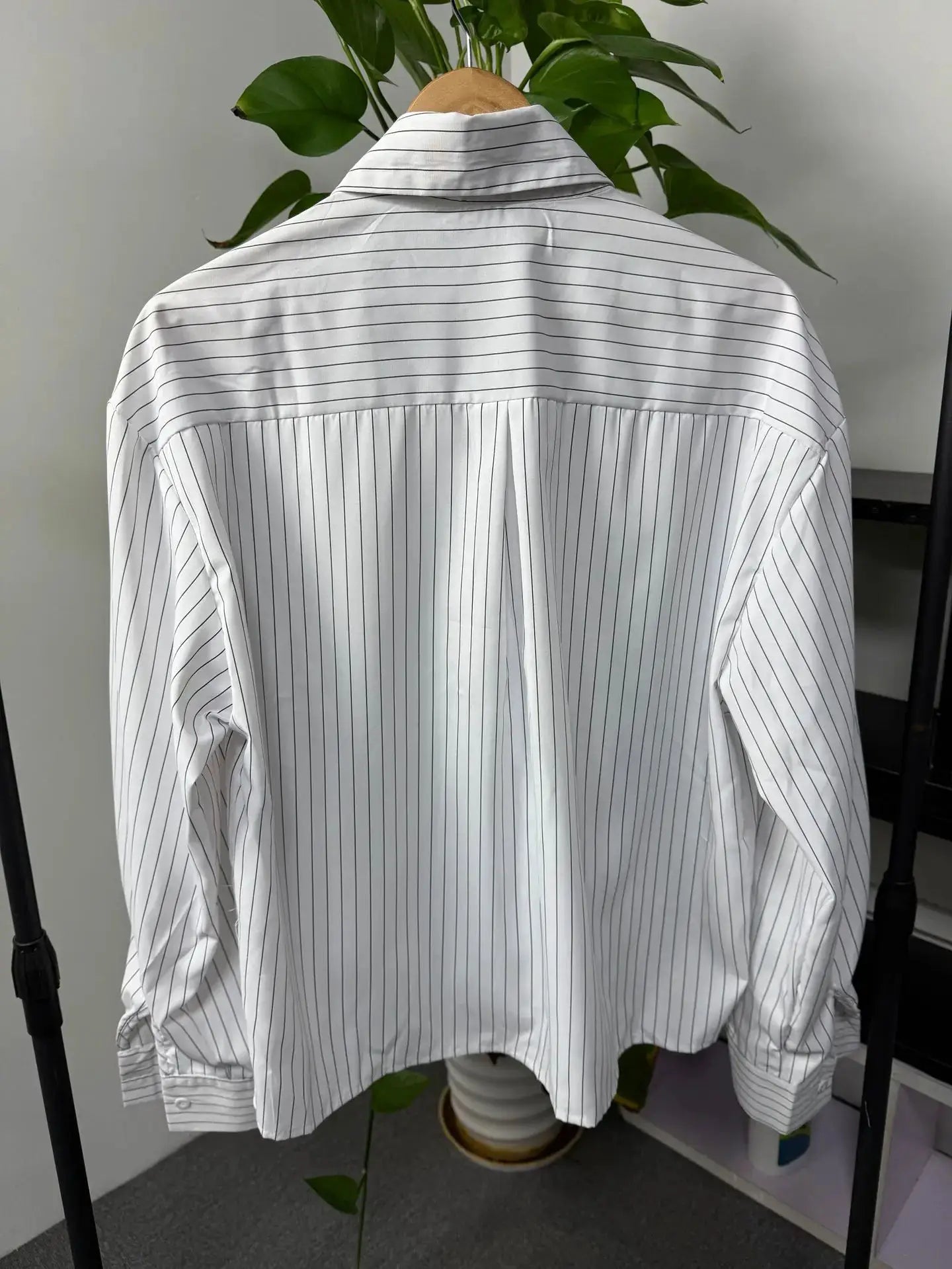 Simples Market men's striped shirt, white with thin black pinstripes, loose-fit long sleeves, back view