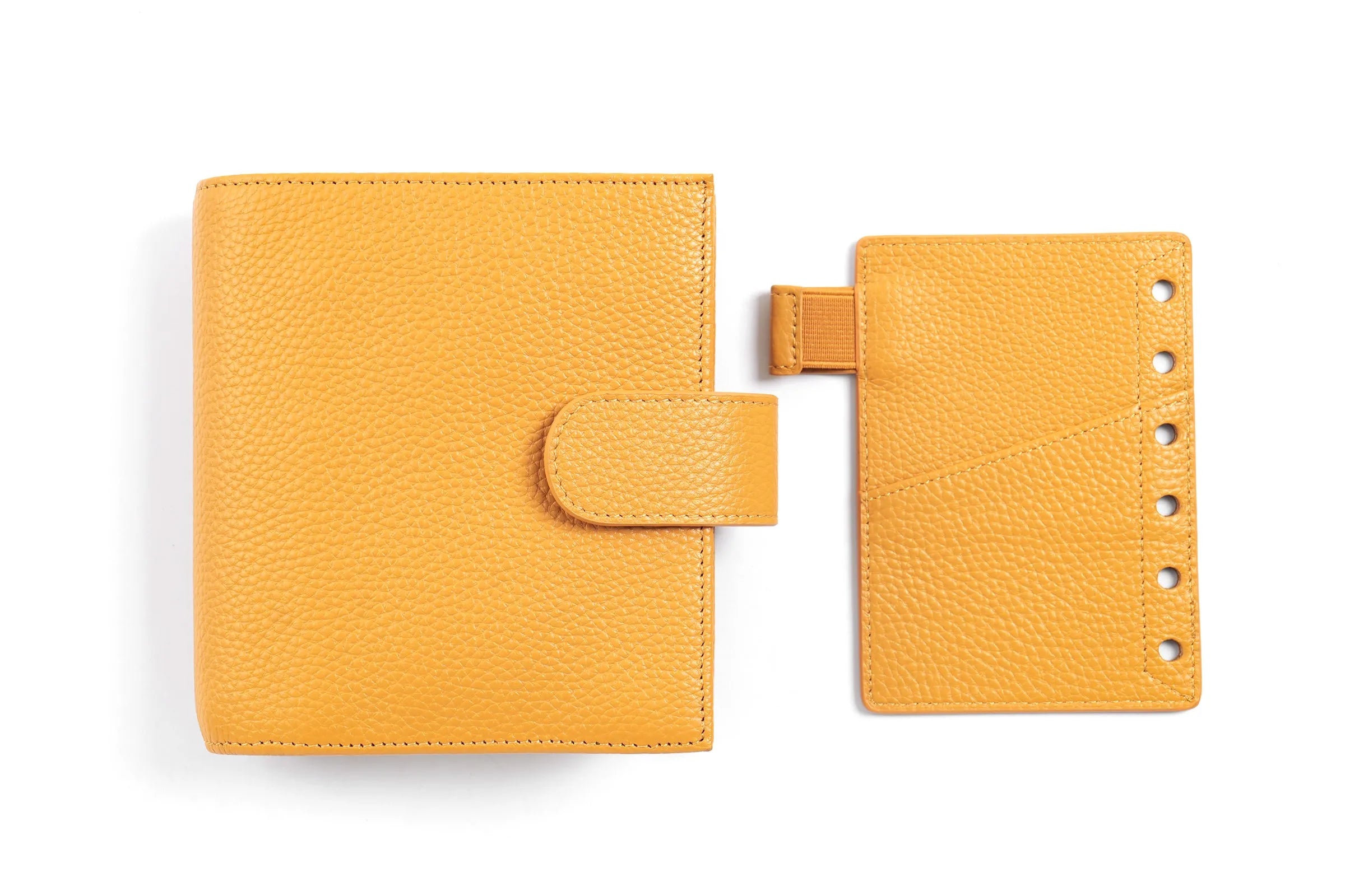 Moterm Luxe 2.0 pocket planner set in orange pebbled leather; 2-piece organizer with cover and ring binder insert.