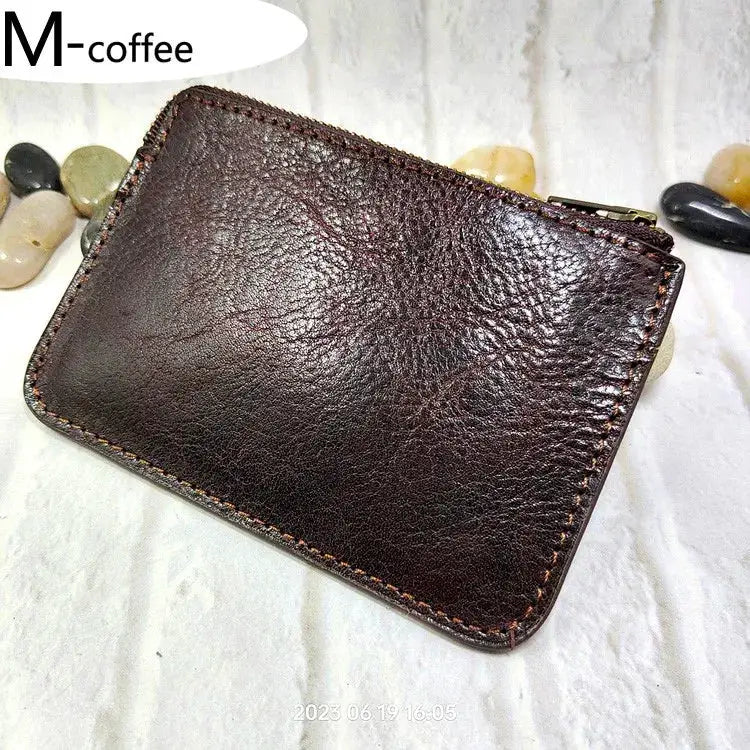 Mini zipper waist bag in brown leather by Simples Market, compact card/phone belt pack