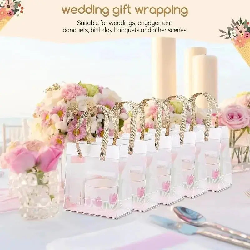 10-pack frosted clear gift tote bags with gold handles and pink floral accents.