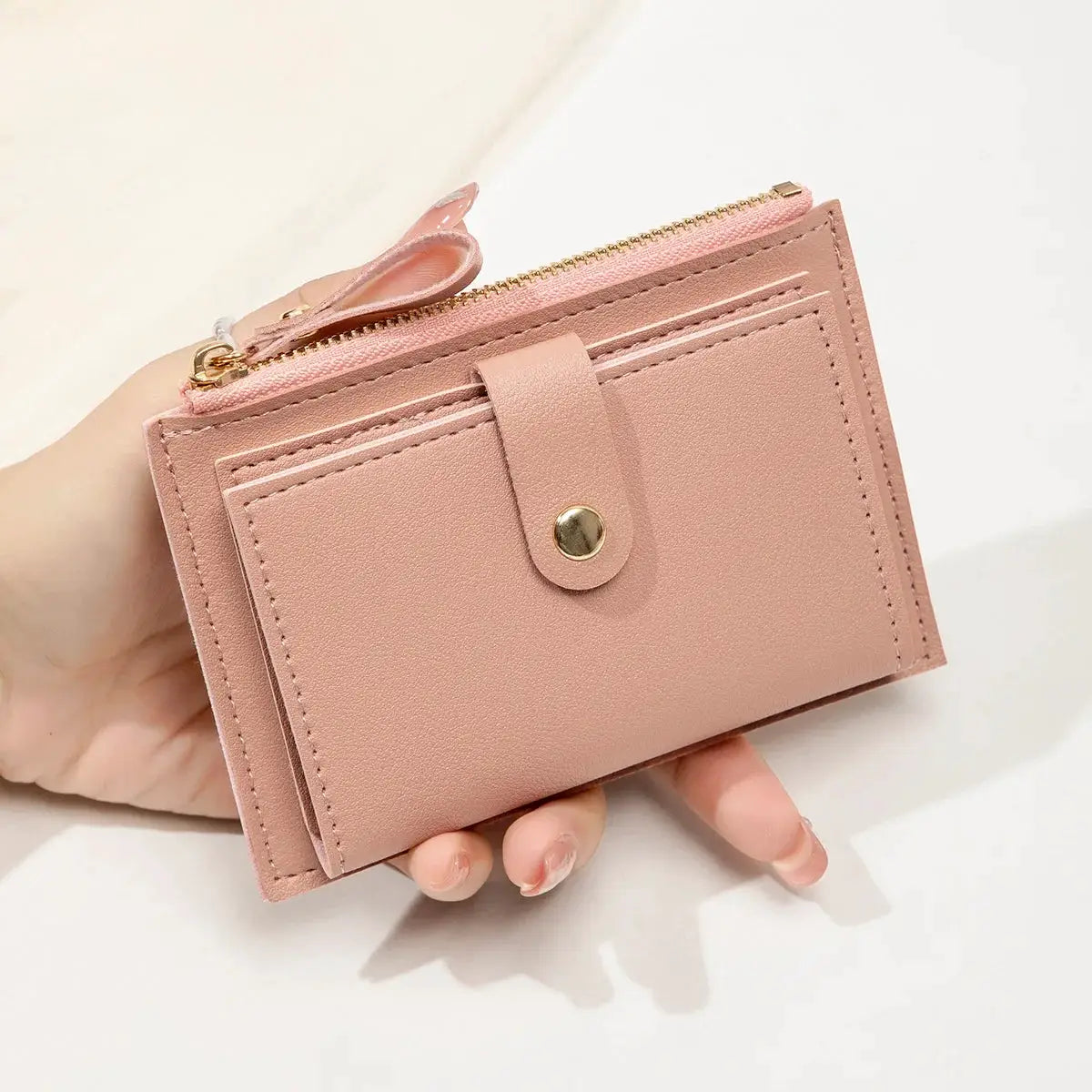 Simples Market pink PU leather mini wallet with zipper and front card slots