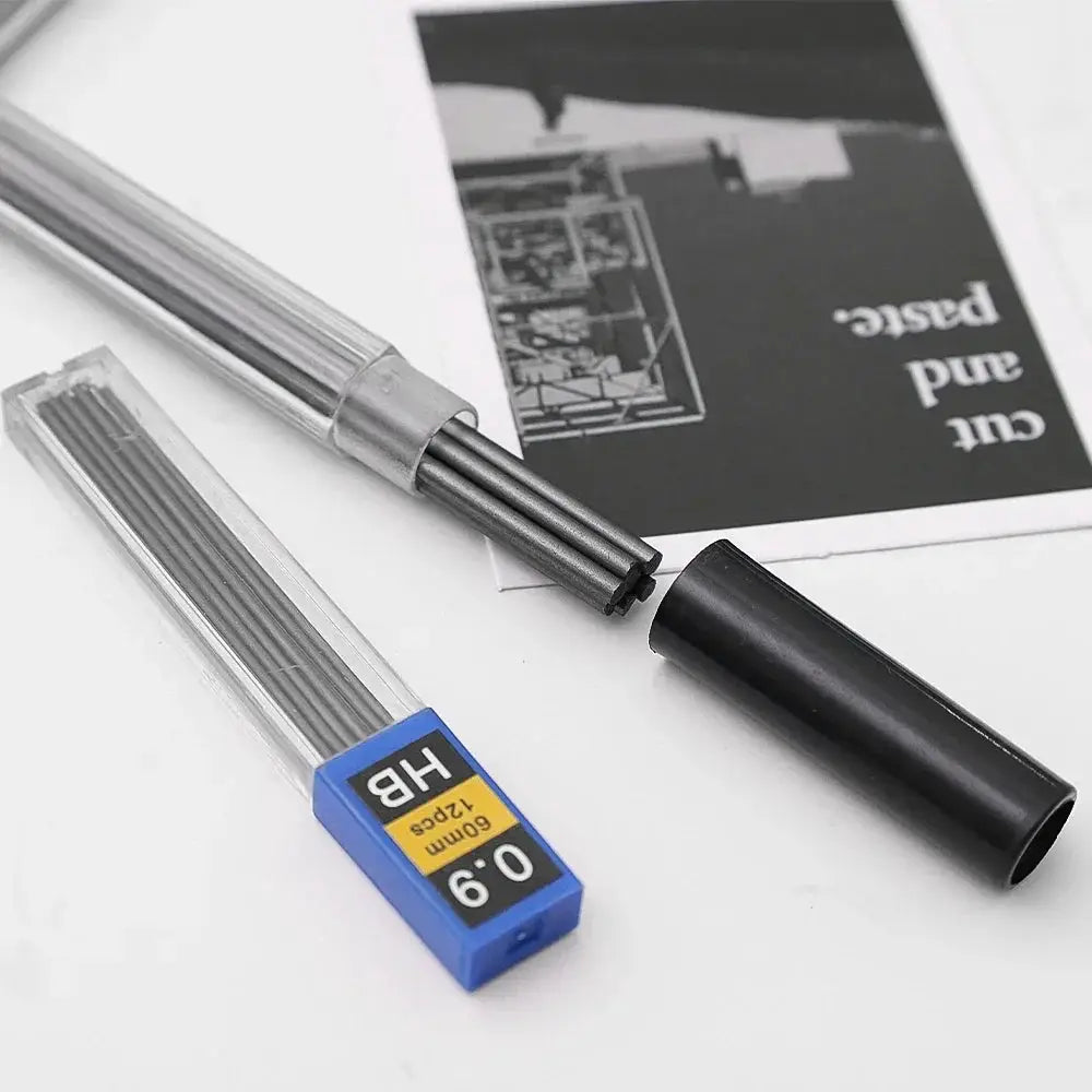 Metal mechanical pencil set with silver body, blue lead refill case, and black cap.