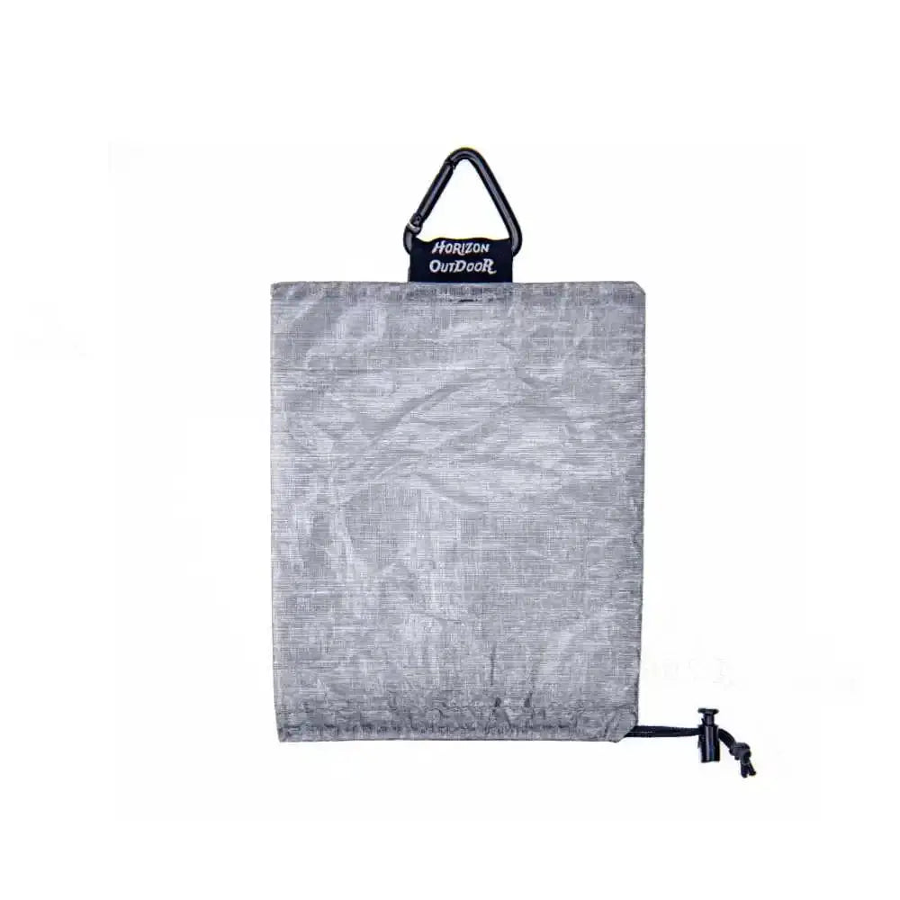 STASHLITE Dyneema DCF stuff sack in gray Cuben fiber with carabiner top by Simples Market