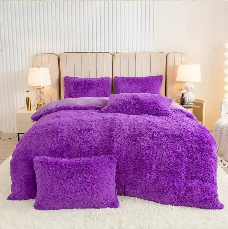 3-Piece Plush Duvet Cover Set in purple with fluffy bedding and pillows on a beige upholstered bed