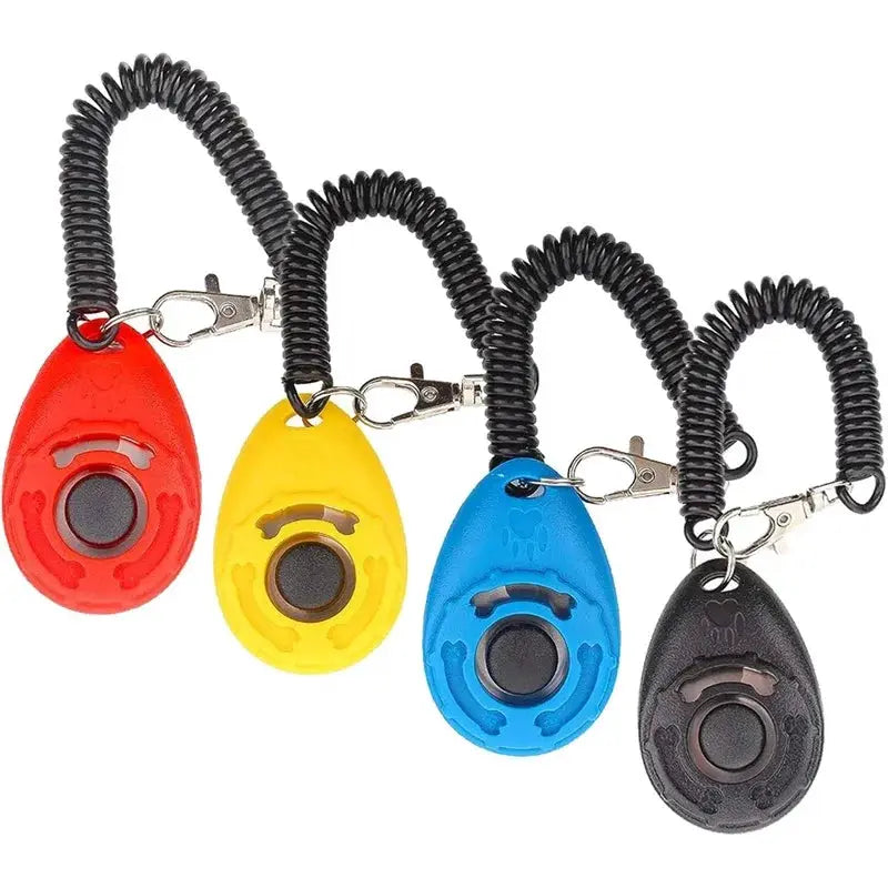 4-piece adjustable dog training clicker set by Simples Market in red, yellow, blue and black with coiled wrist straps