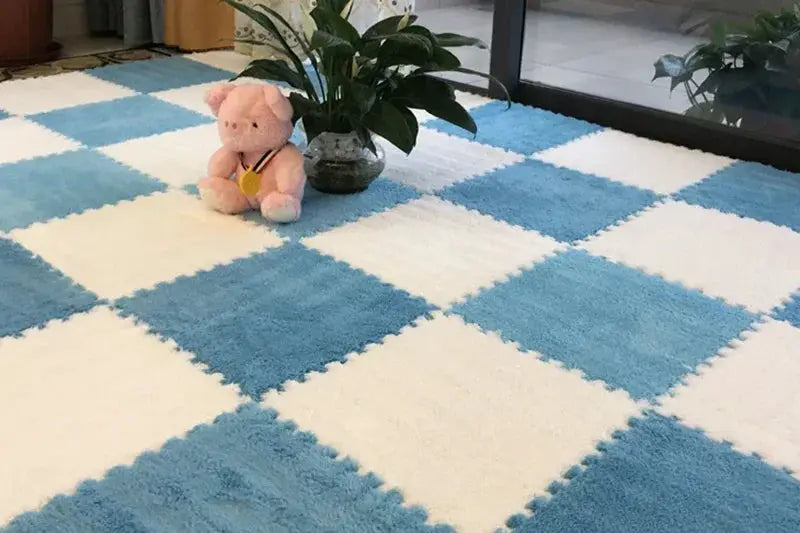Soft EVA foam puzzle play mat in blue and white checkerboard, interlocking baby rug by Simples Market