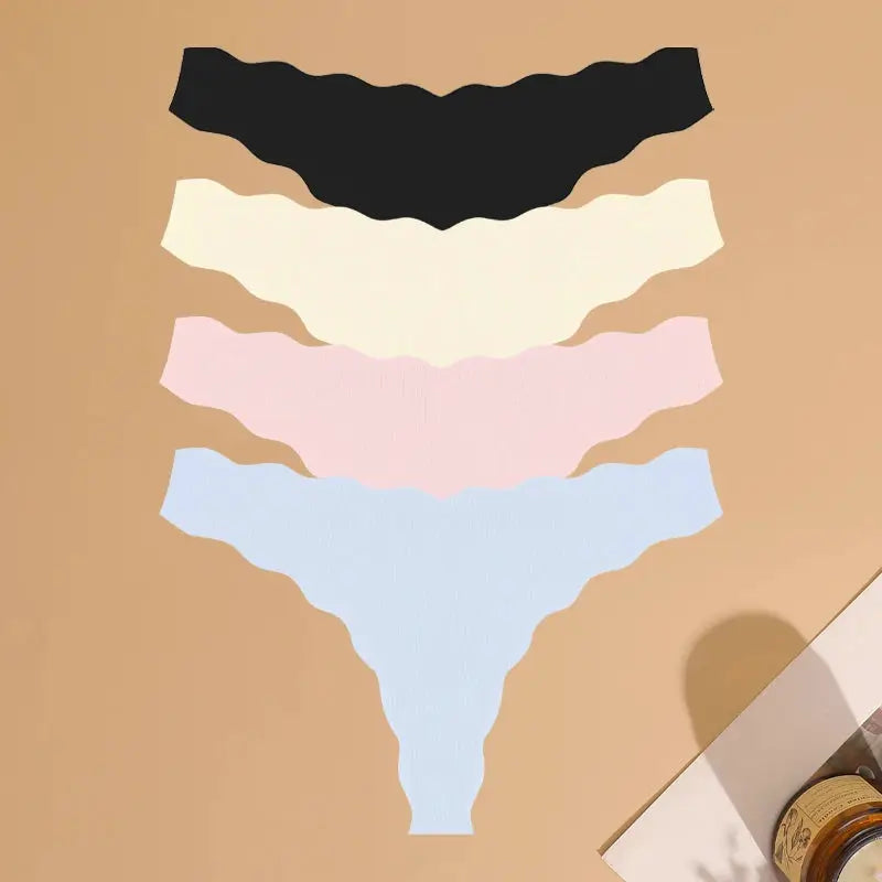 4-piece seamless low-waist thong underwear set in black, ivory, pink, and light blue