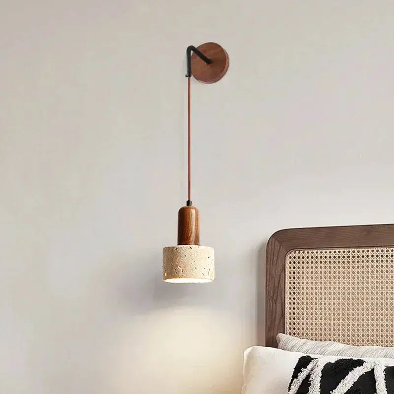 Wall sconce lamp with natural Stone cylindrical shade and peach wood accents, Simples Market bedside LED light