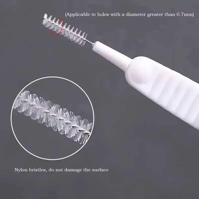 Shower cleaning brush with nylon bristles and white handle, anti-blocking nozzle by Simples Market