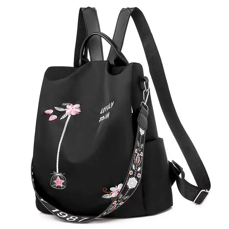 Waterproof Oxford women's backpack with floral embroidery, black large-capacity bag and patterned strap