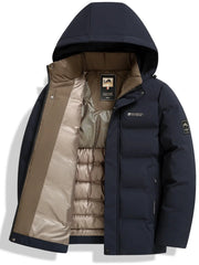 Men's navy quilted puffer jacket by Simples Market with tan inner lining and hood