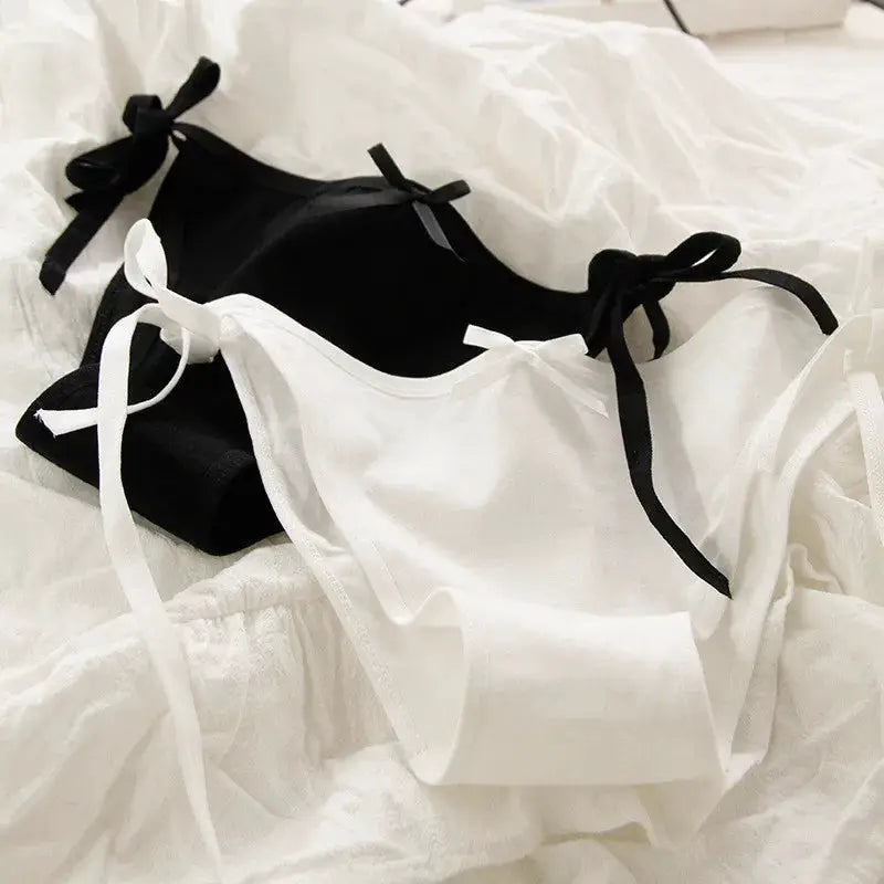 Alluring lace-up briefs with ribbon bows, black and white low-waist women's underwear by Simples Market.