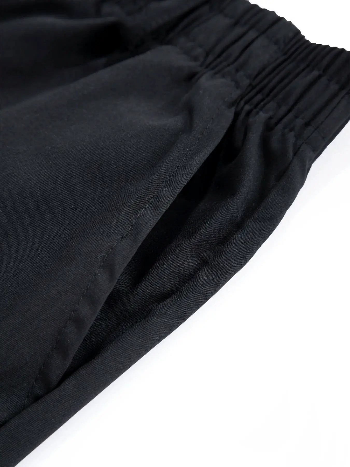 Men's black cargo sweatpants with elastic waistband, loose straight fit.