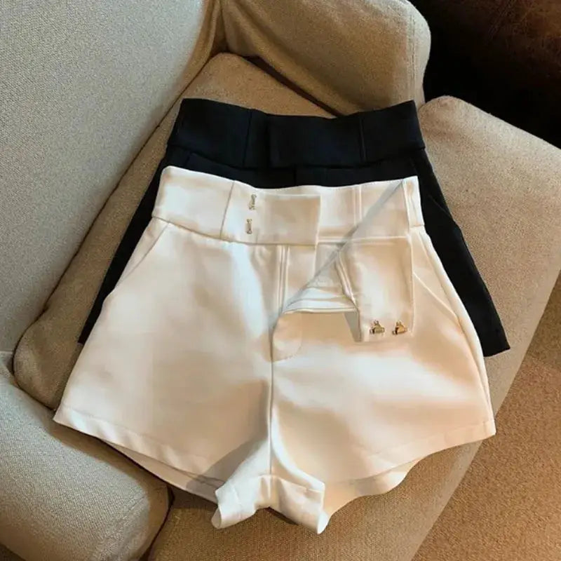 Two high-waisted women's shorts in white and black, A-line slim casual style