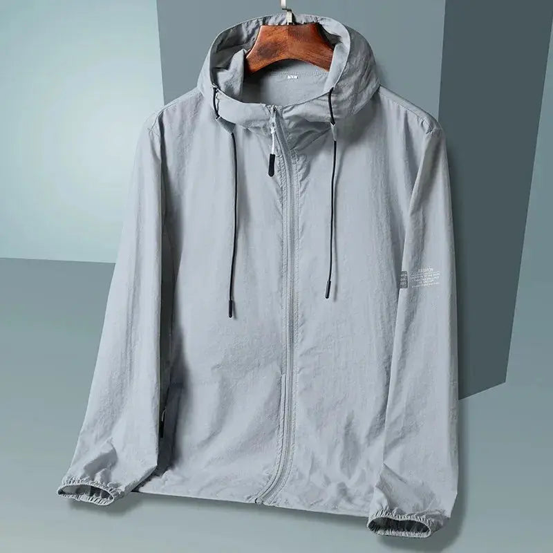 Simples Market hooded windbreaker jacket in light gray with front zipper and adjustable drawstrings.