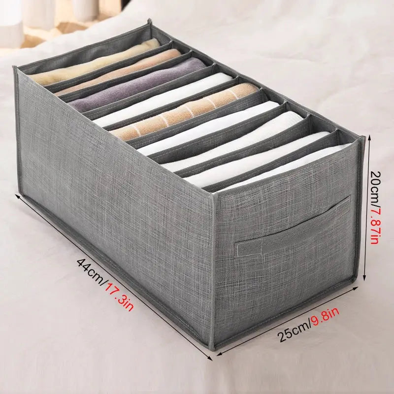 Wardrobe storage organizer by Simples Market, gray fabric with 8 divided compartments and a front pocket