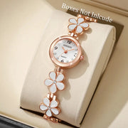 Rose-gold GOUGOU women's quartz watch with flower-link bracelet, white enamel petals, and crystal hour markers.