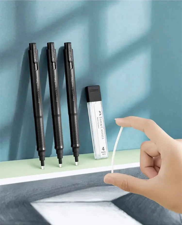 Faber-Castell retractable automatic pencils, set of 3 in black with erasers, plus a refill bottle beside them