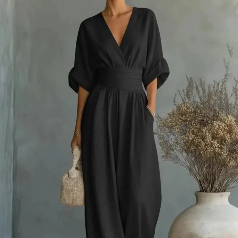 Black waist V-neck jumpsuit with mid-sleeve and wide-leg silhouette, solid color