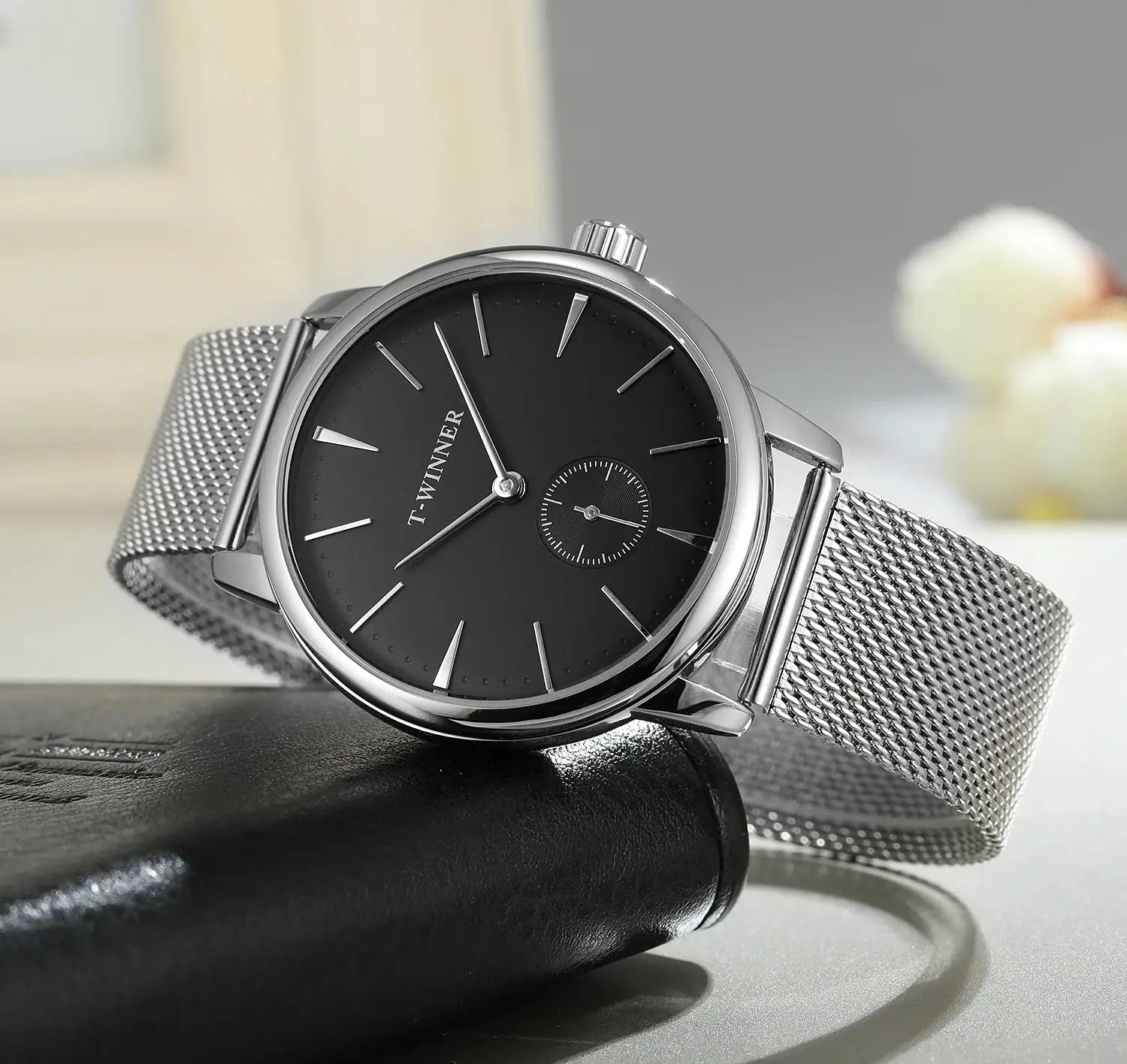 T-WINNER mesh strap wristwatch with black dial and silver case