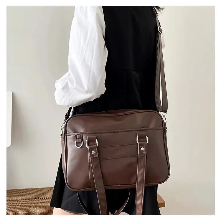 Japanese style JK bag in brown PU leather with top handles and adjustable crossbody strap