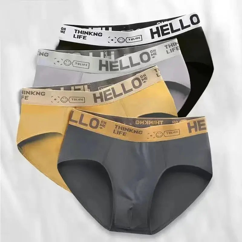 Men's briefs 4-pack with elastic waistbands in black, gray, yellow, and navy.