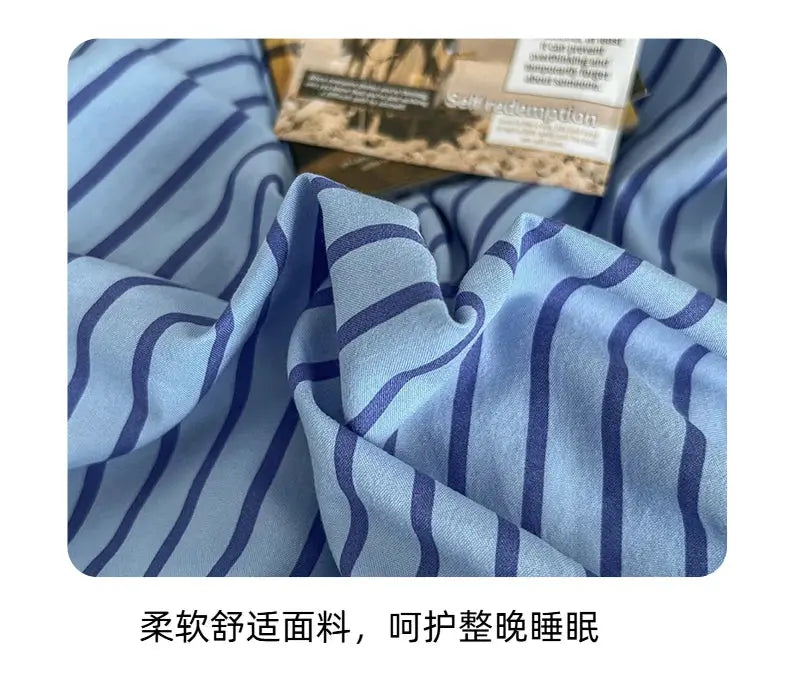Bedding set by Simples Market with blue striped duvet cover, pillowcase and bedsheet