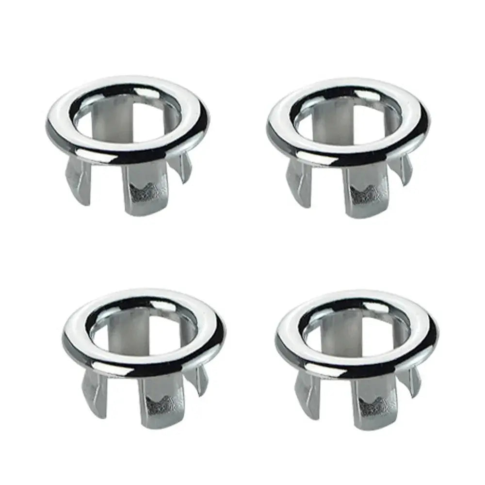 Four chrome-plated plastic sink overflow rings with mounting tabs