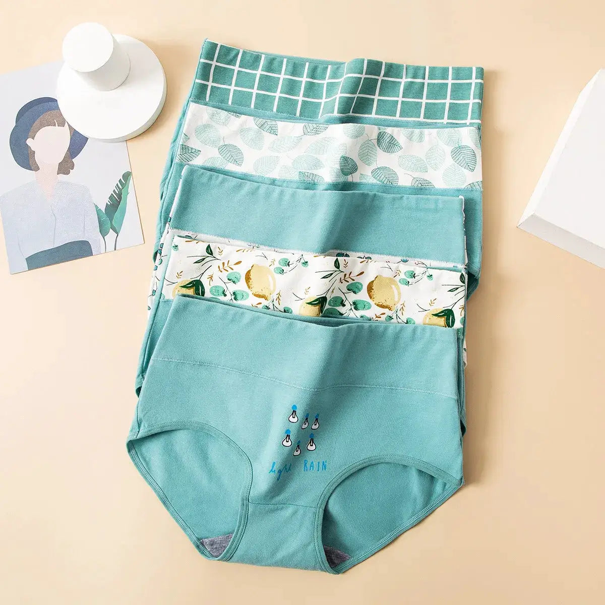 4-pack cotton women panties in teal with grid, leaf and lemon prints; high-rise breathable briefs by Simples Market