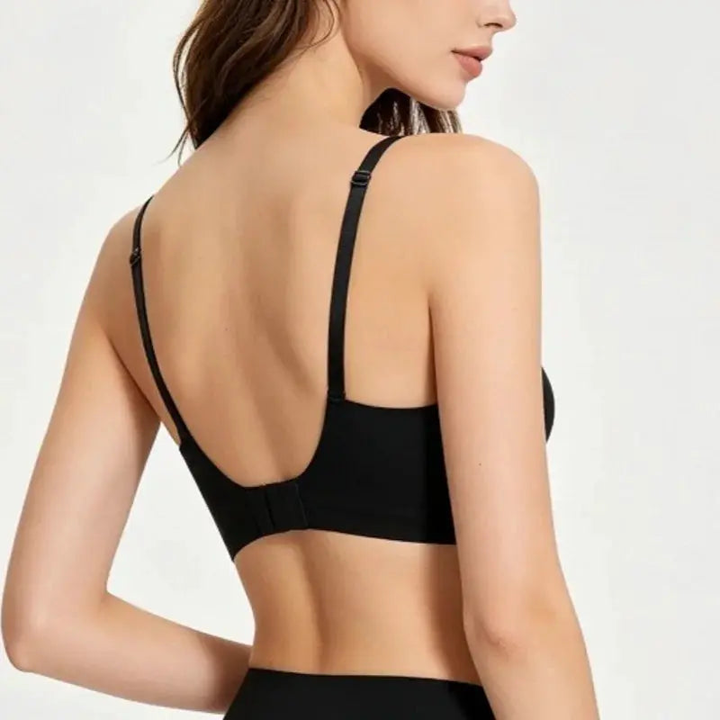 Push-up seamless bra for women in black with adjustable straps and back clasp