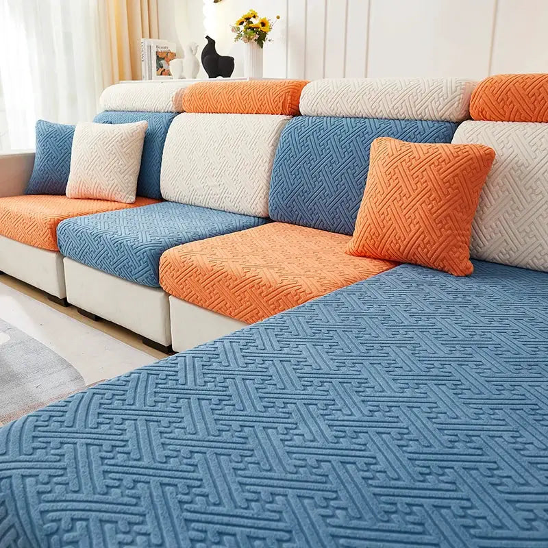 Thick jacquard sofa slipcover set with blue, orange and cream cushions; stretchable furniture protector