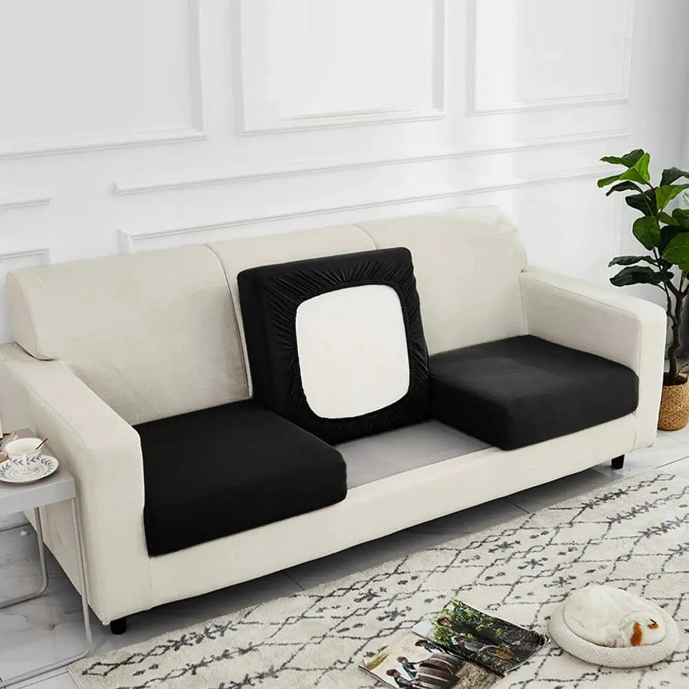 Simples Market one-piece solid milk-silk elastic sofa cover on white sofa with black cushions; dust-proof and washable