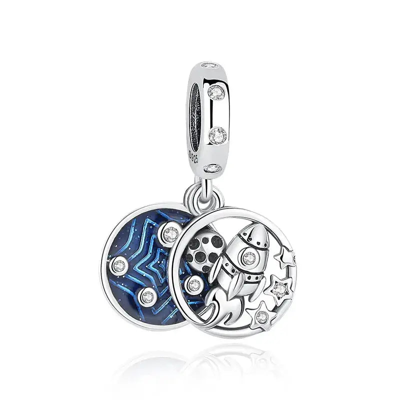 Sterling silver charm set; two round beads with zircon accents, blue enamel pattern and rocket/star design for bracelets