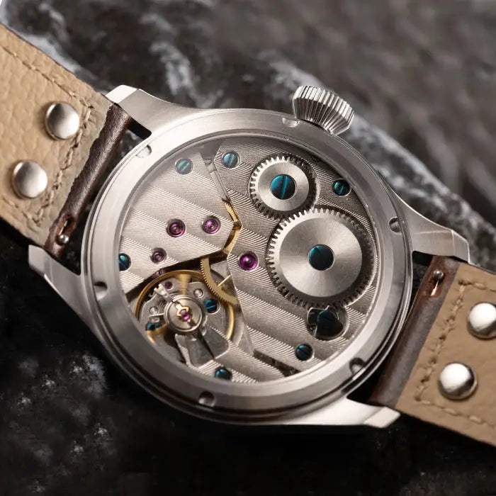 Hruodland Pilot 42mm watch with stainless steel case, brown leather strap, exhibition case back, visible movement