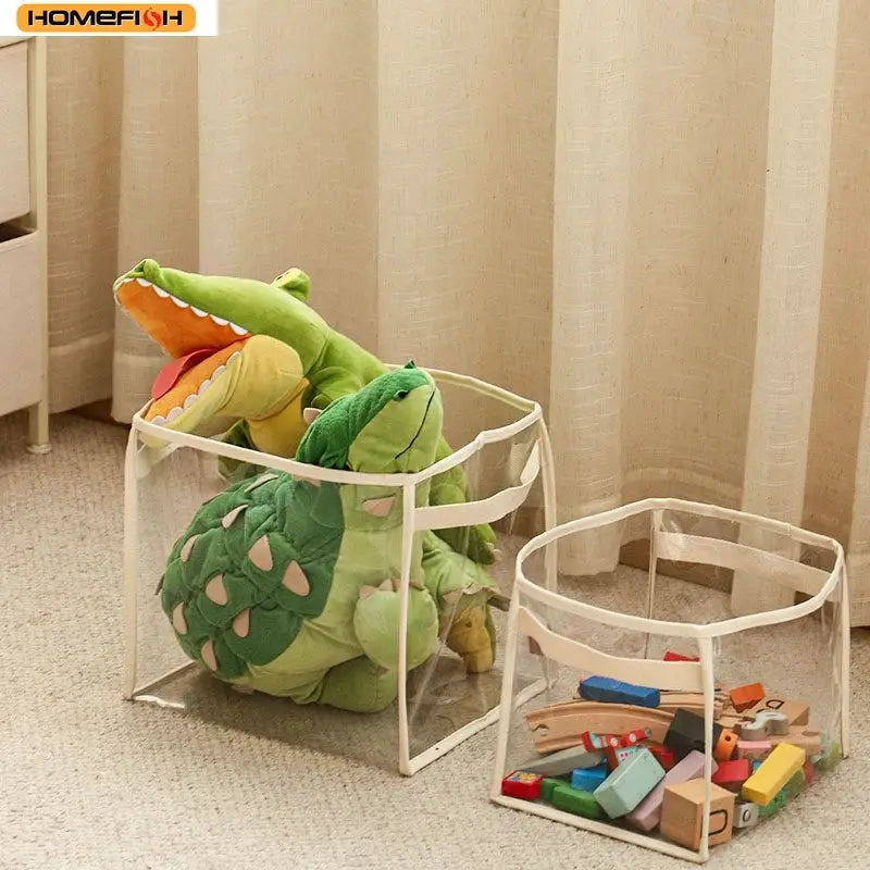 Homefish transparent toy storage basket with large plush dinosaur and a clear box of wooden blocks