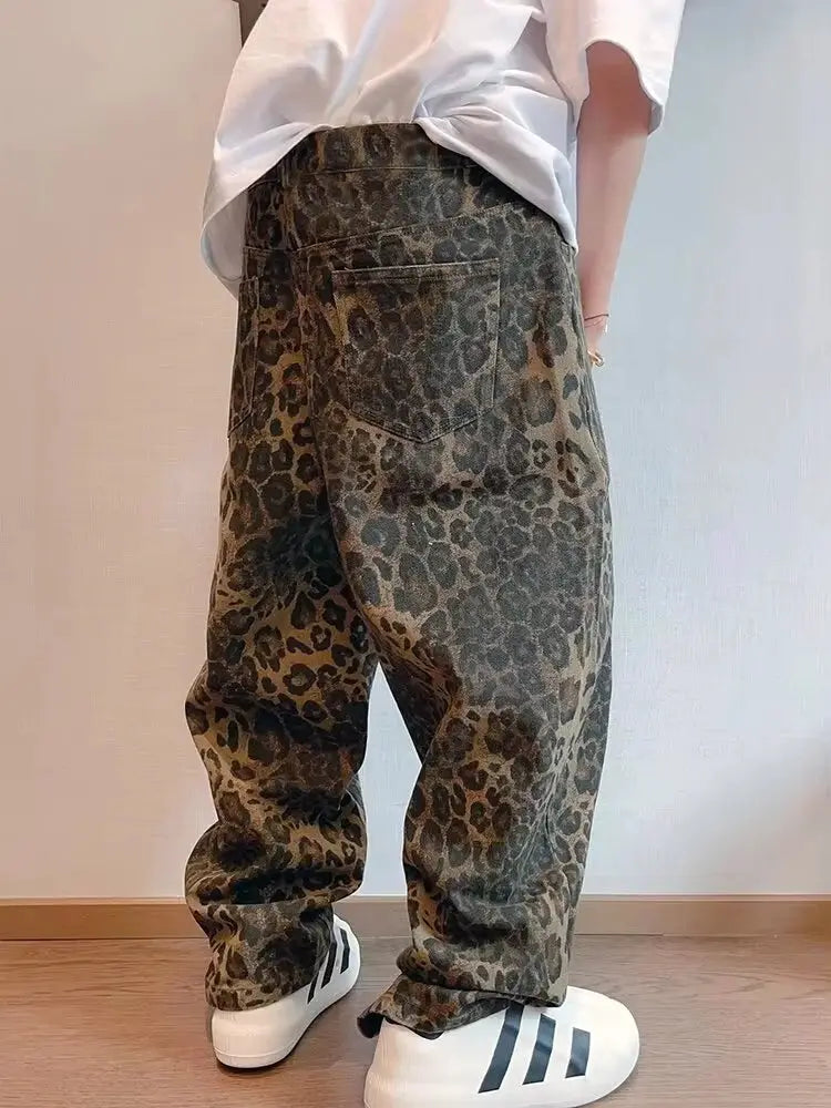Men's leopard print denim jeans in autumn tan, oversized wide-leg pants.