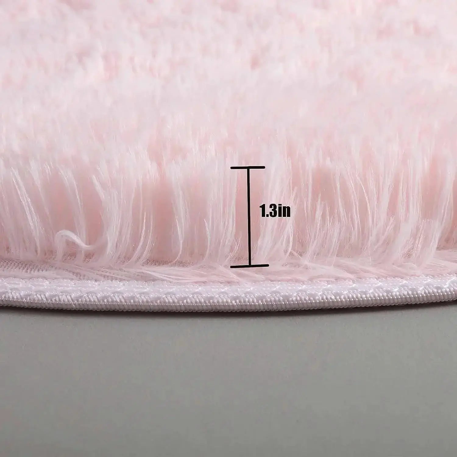 Simples Market plush round rug mat; fluffy pale pink and white pile, 1.3in high.