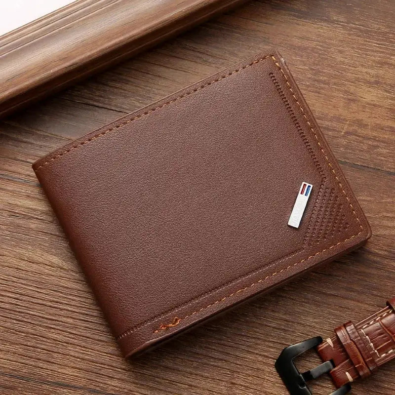 Men's brown leather short wallet by Simples Market; slim, foldable, minimalist design.