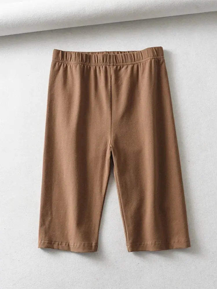 Women's high-waist brown knee-length biker shorts by Simples Market