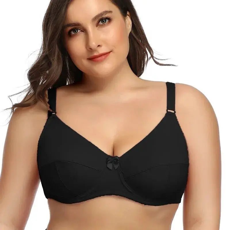 Beauwear plus-size black underwire bra with unpadded cups and center bow; adjustable straps.