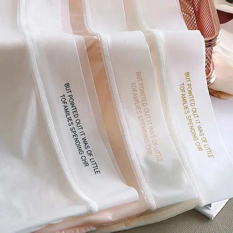 Three pairs of women's panties by Simples Market; ice silk quick-drying seamless underwear in white, beige, and peach