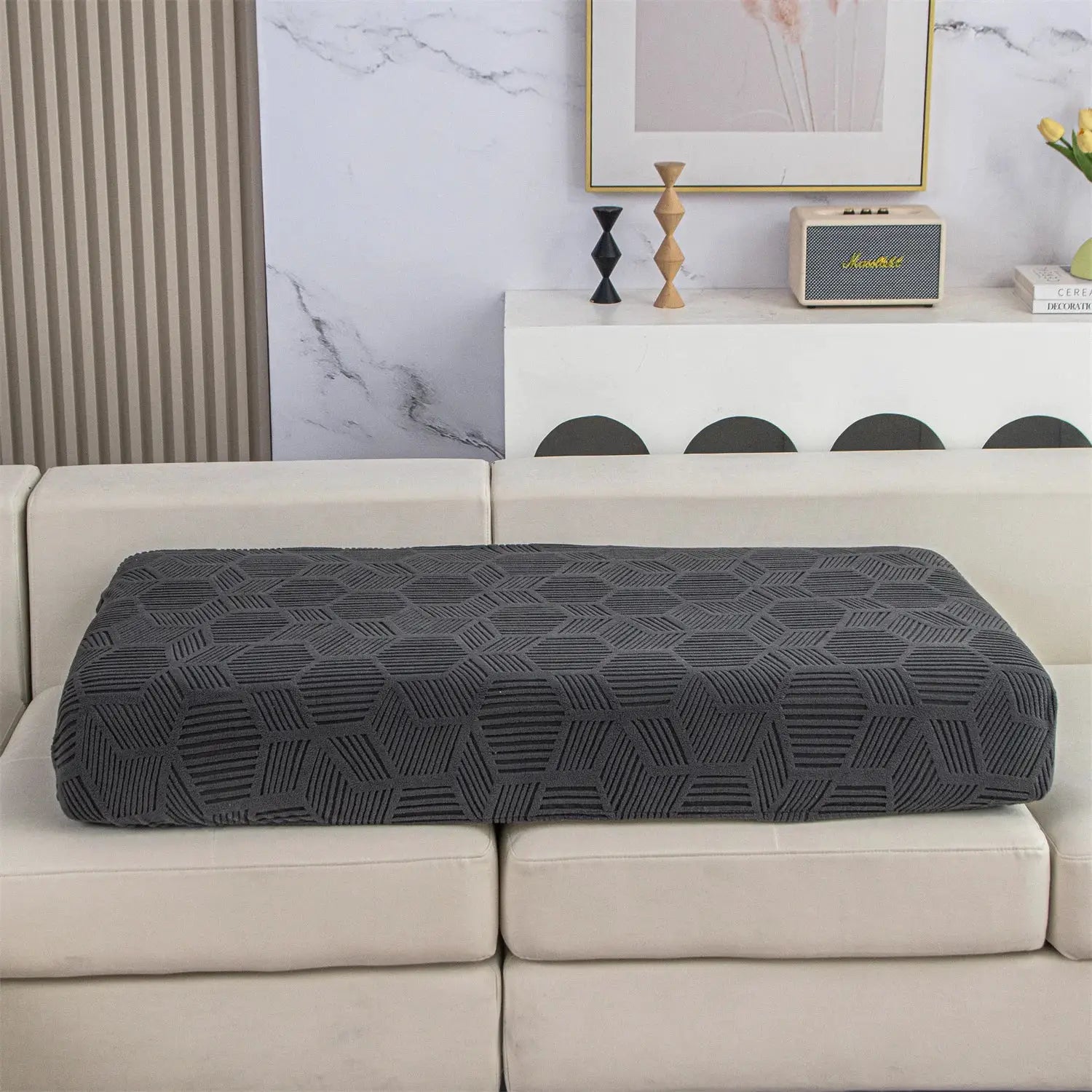 1Piece Universal Peism Jacquard Stretch Sofa Cover in dark gray geometric pattern on beige sofa