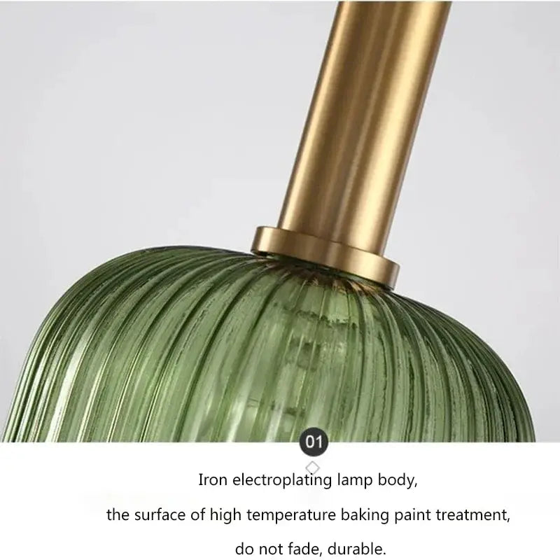 Nordic glass pendant light with green ribbed shade and brass stem by Simples Market