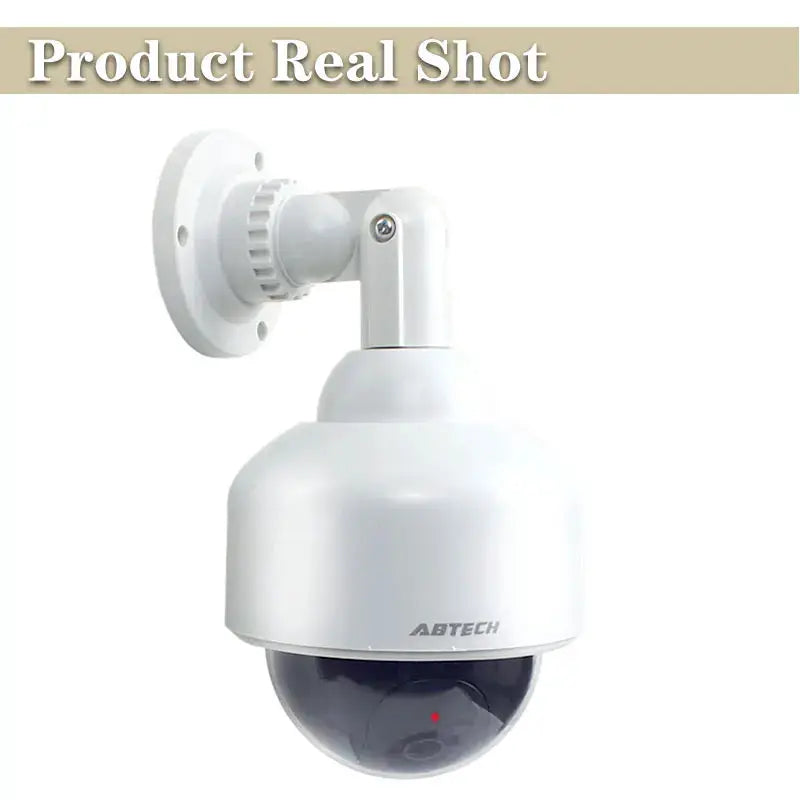 ABTECH outdoor dome security camera on wall mount; white IP54 rainproof with CCTV warning sticker