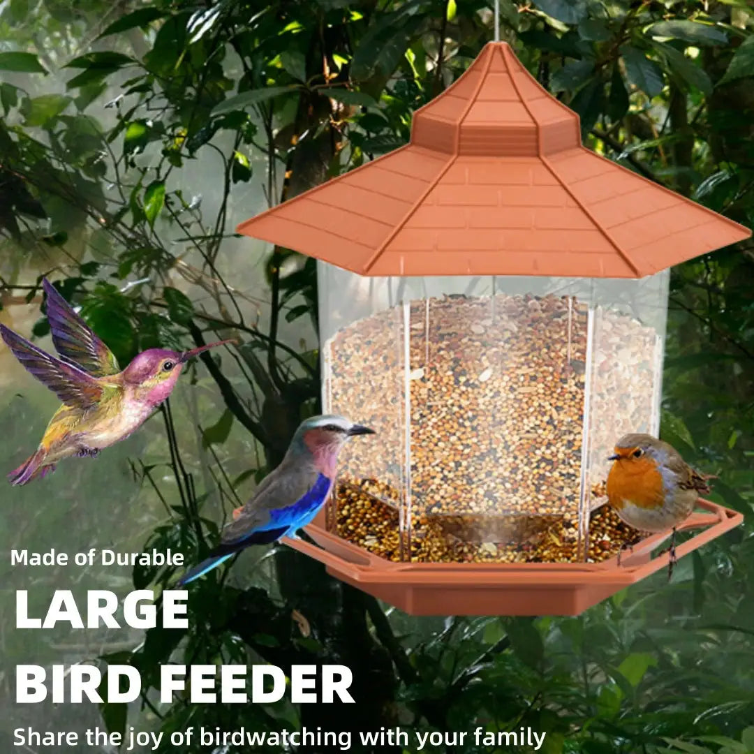 Large outdoor bird feeder with a transparent seed chamber and peach roof, hanging multi-hole feeding station.